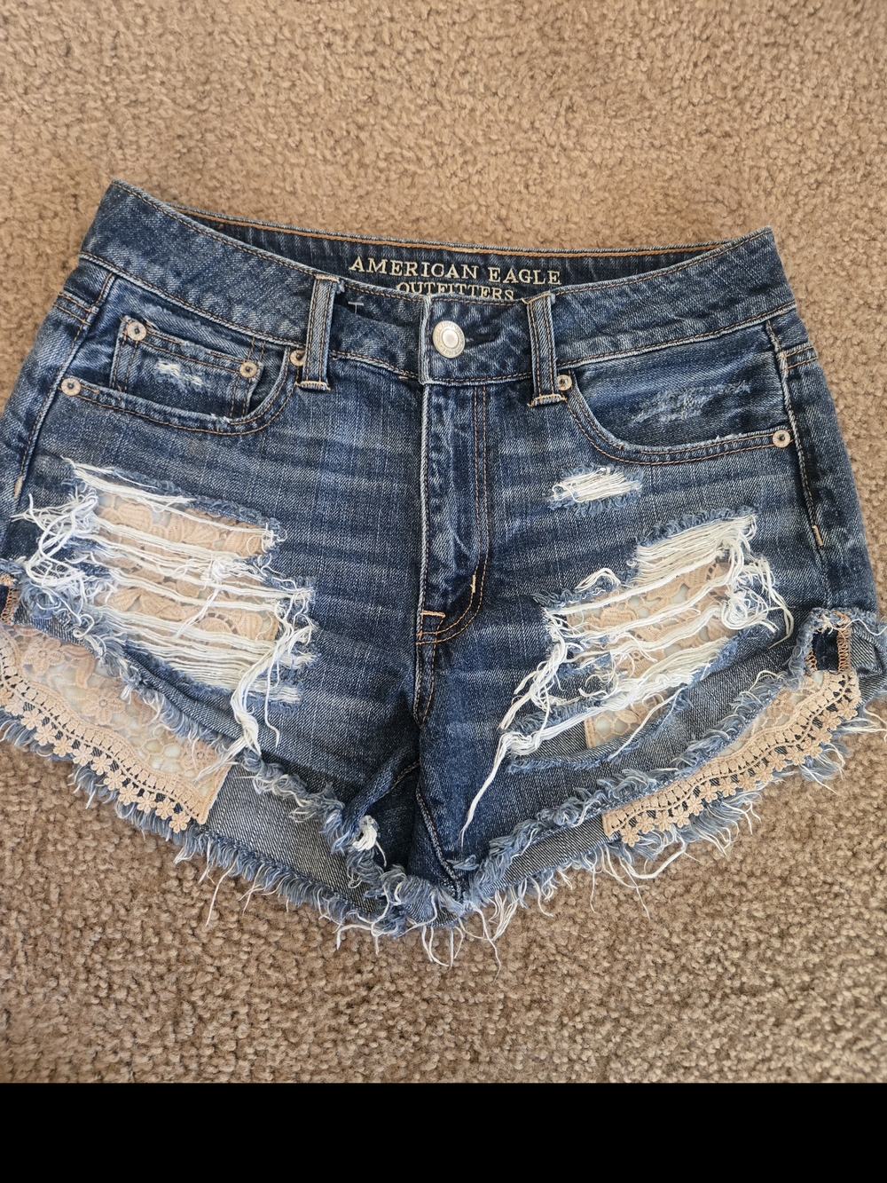 American Eagle Outfitters Dark Blue Distressed Denim Shorts with Beige Lace Trim